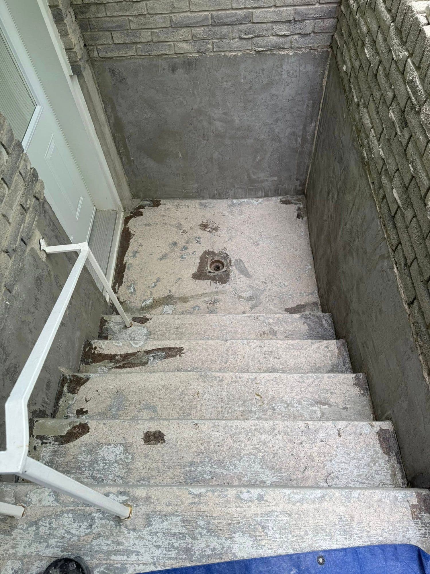 Walkout before — bare concrete